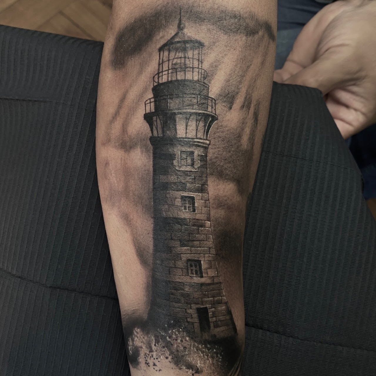 Professional tattoo realism lighthouse Caos Tattoo Santiago Chile